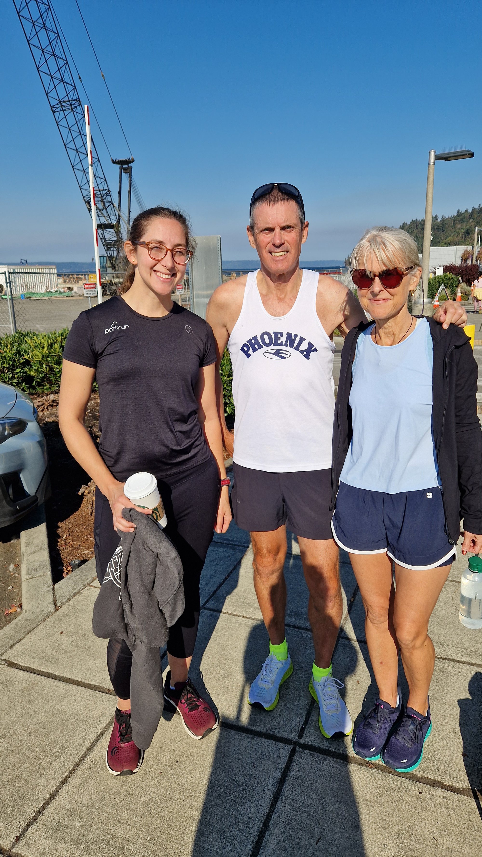 Mike and Emma with race director Dena at Des Moines Creek parkrun